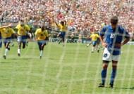 Brazilian players run to join their teammates as I